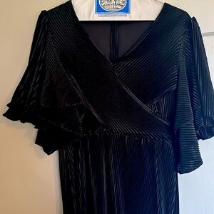 Black twist front dress ruffle type sleeve.